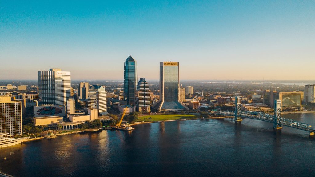 city skyline under blue sky during daytime