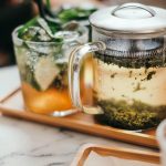 clear glass mug on tray