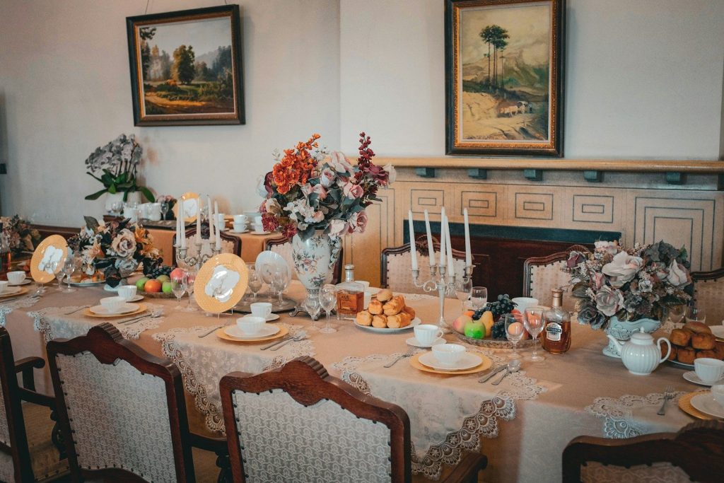 A formal dining table set for a tea party.