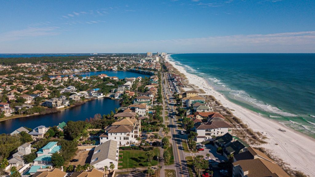 aerial view of city near sea during daytime