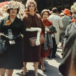 a group of women standing next to each other