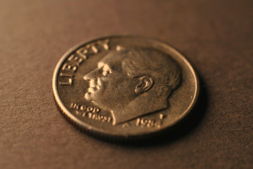 A close up of a coin on a table