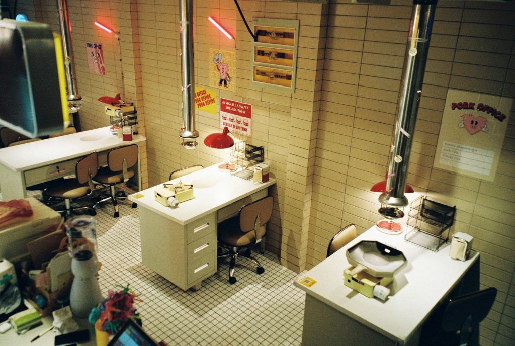 a room that has a bunch of desks in it