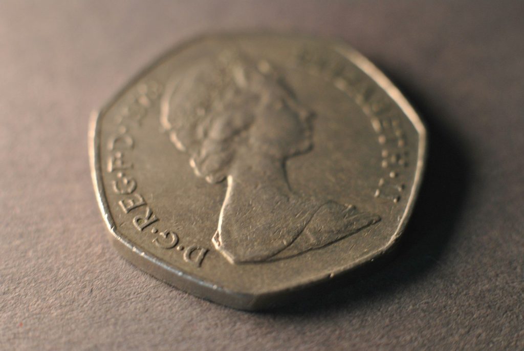 A close up of a coin on a table