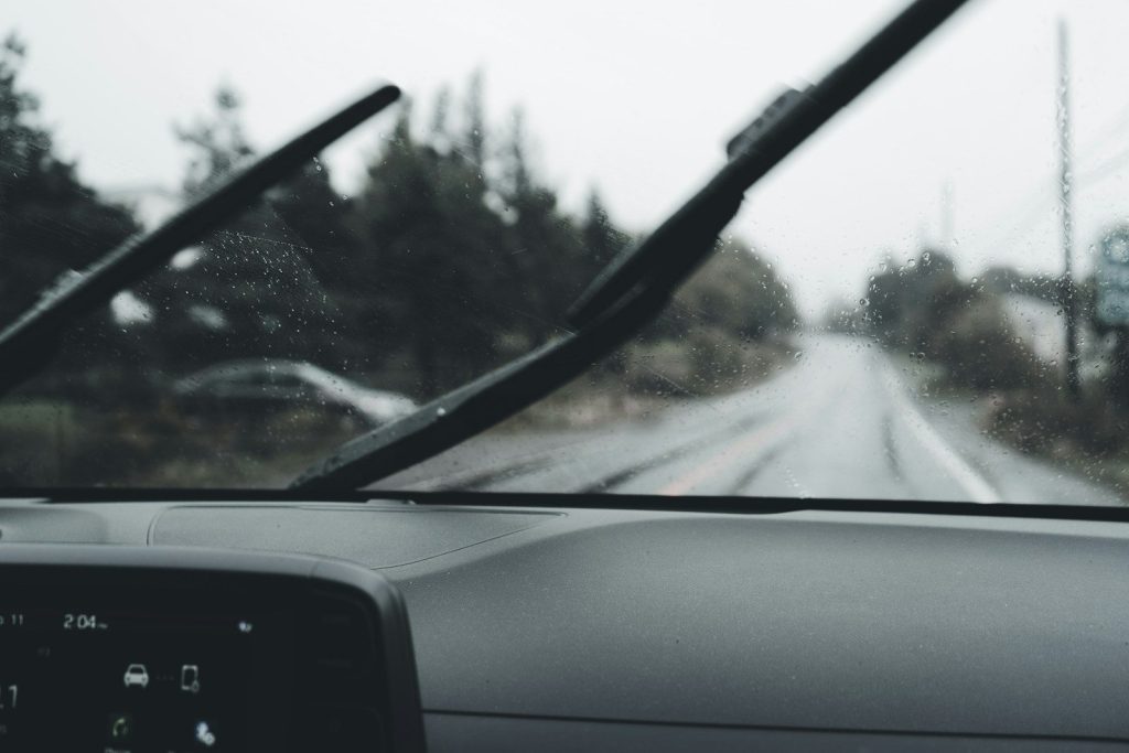a car driving on a snowy road