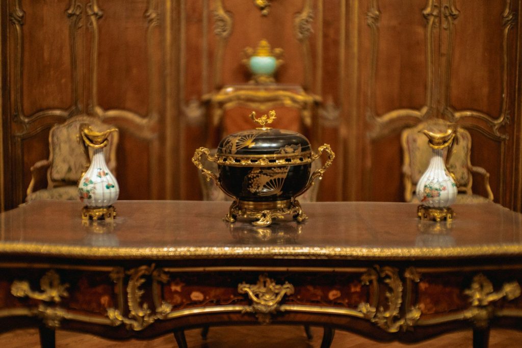 A table with a vase on top of it