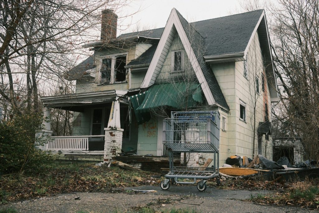 An old, dilapidated house stands abandoned.