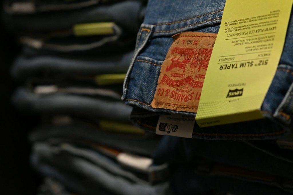 a close up of a pair of jeans with a price tag