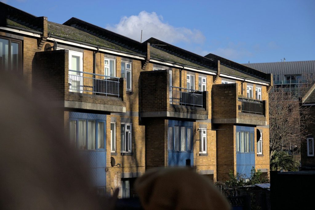a group of buildings with balconies and windows