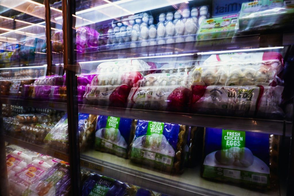 Shelves of packaged food items in a grocery store.