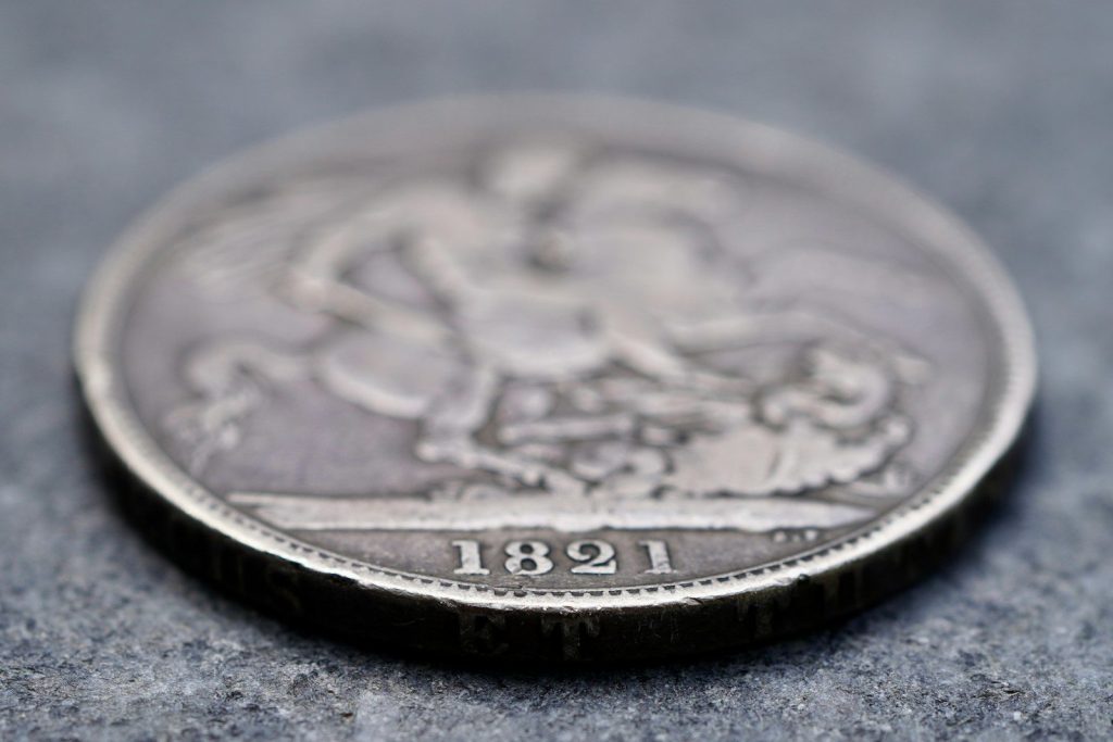 Antique coin with the year 1891 visible