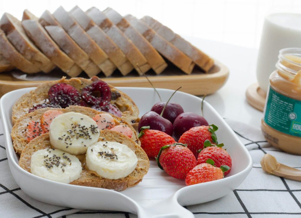 sliced of cake with strawberry on top