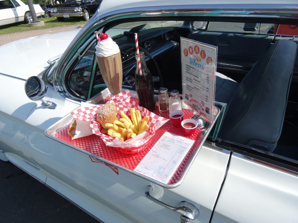 Car hop tray with burger, fries, and milkshake