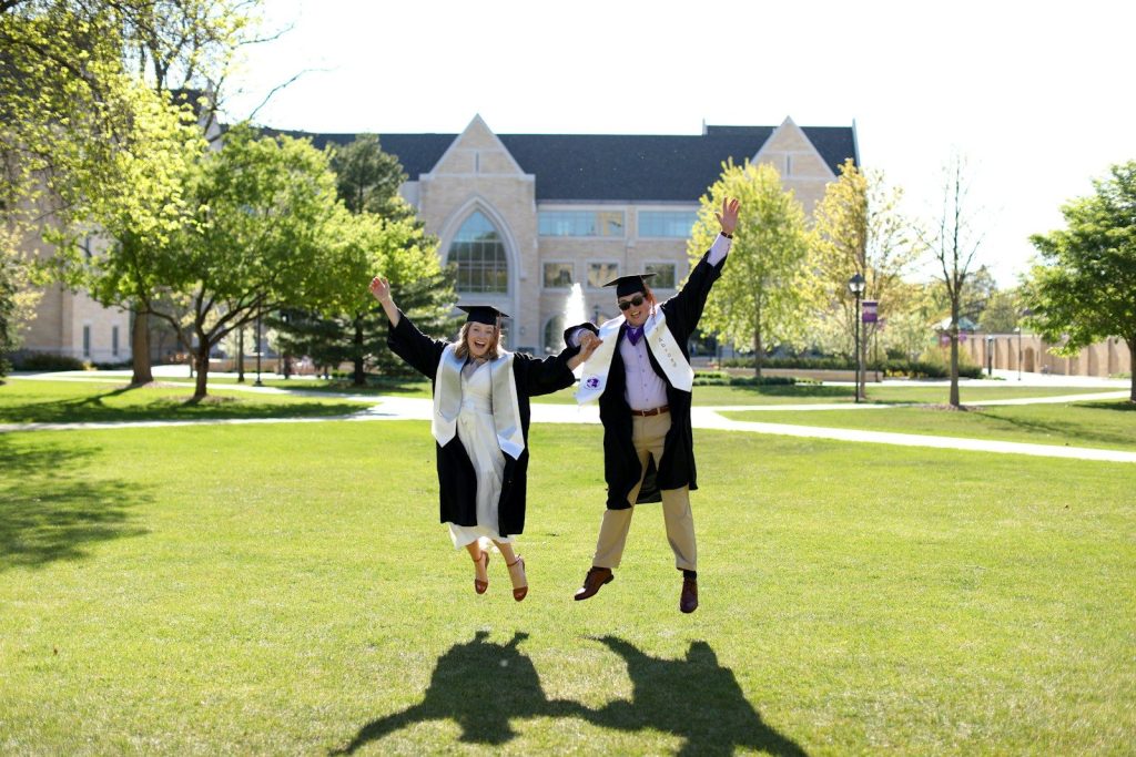 a couple of people that are jumping in the air