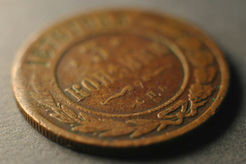 A close up of a coin on a table