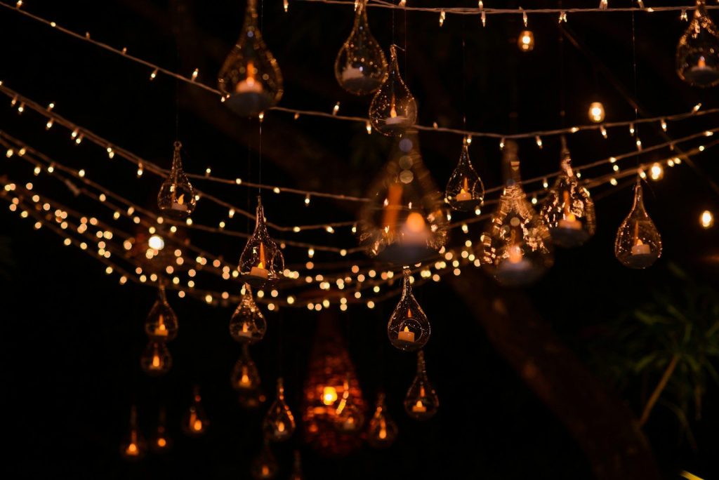 clear glass chandelier turned on during nighttime