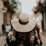 woman wearing sun hat