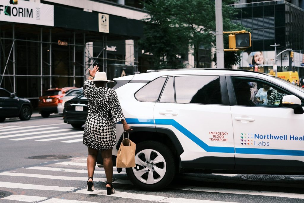 a person walking across a crosswalk