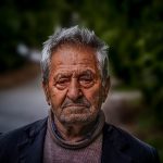 a man with a serious look on his face