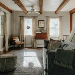 A living room filled with furniture and a fire place