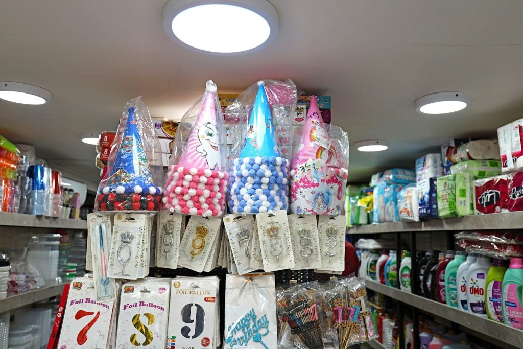Shelves filled with colorful party supplies and decorations