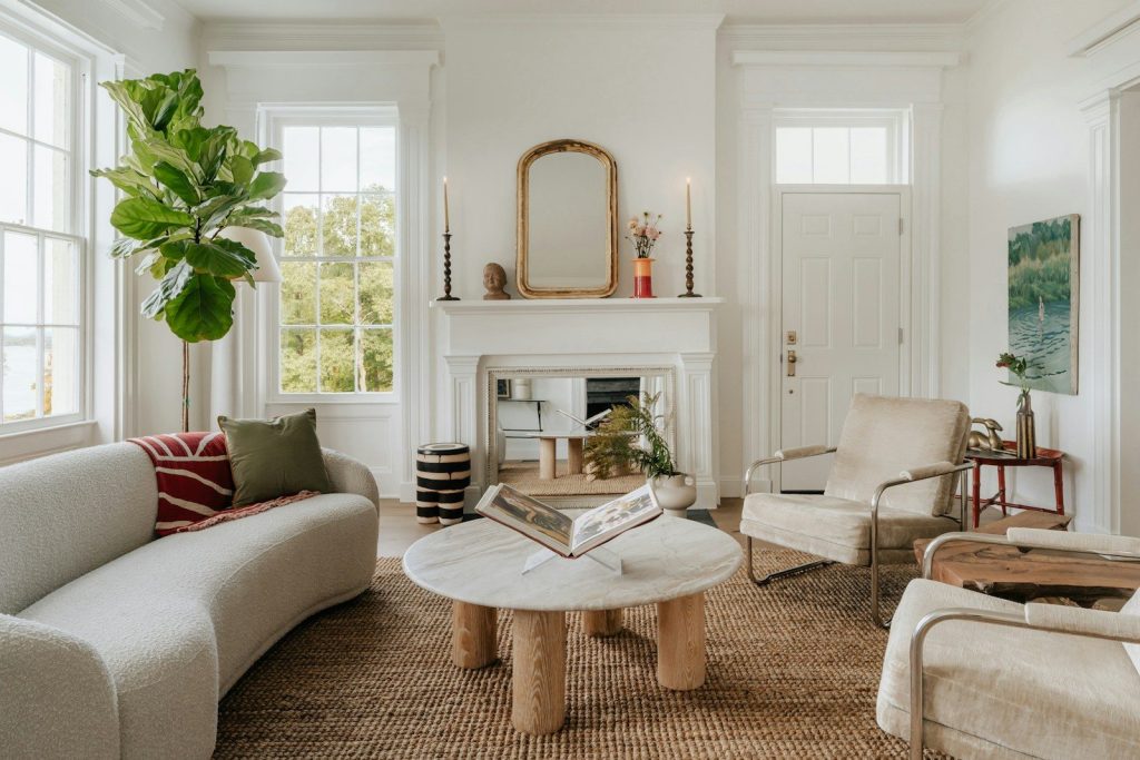 A living room filled with furniture and a fire place