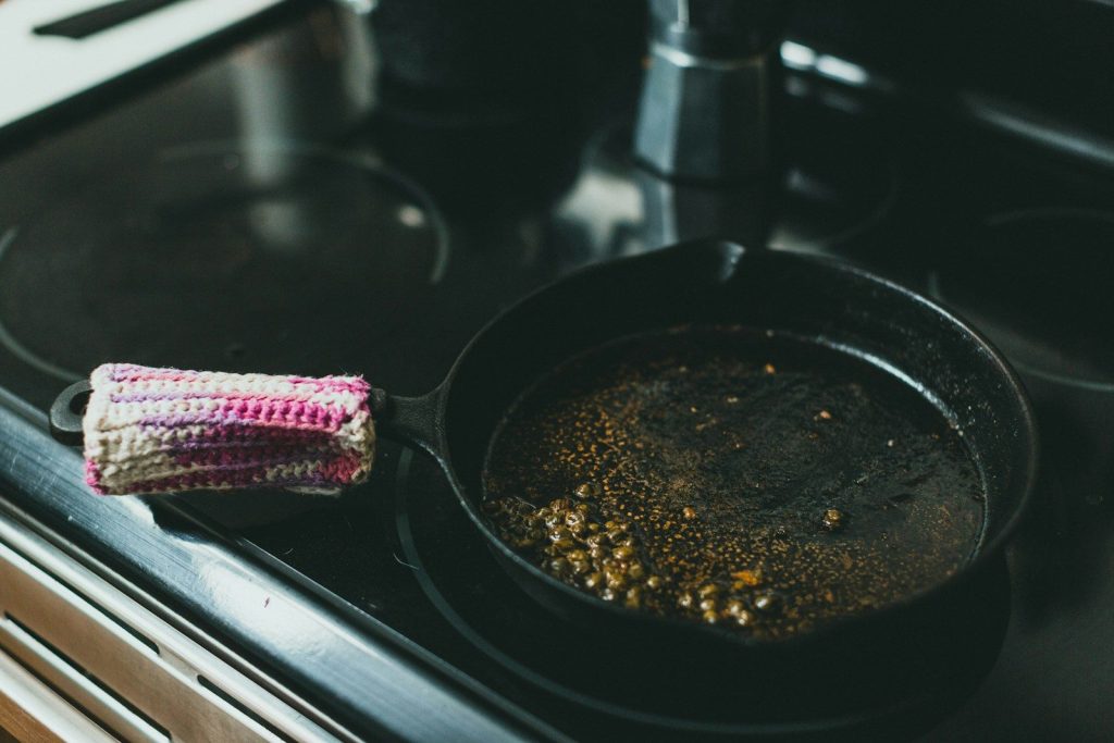 black frying pan on stove