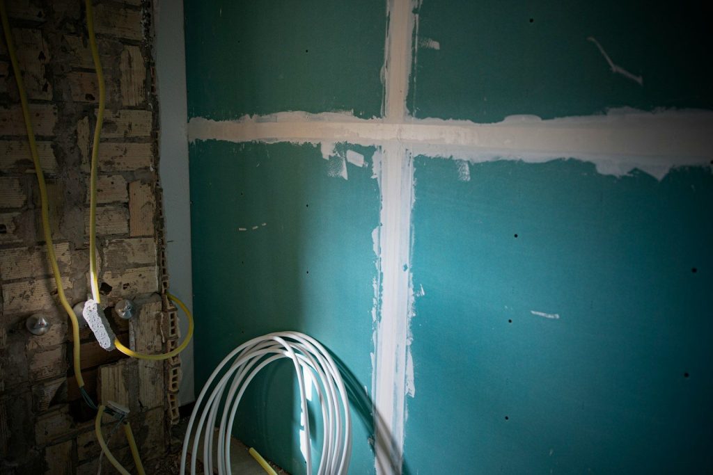 a wall that has some wires attached to it
