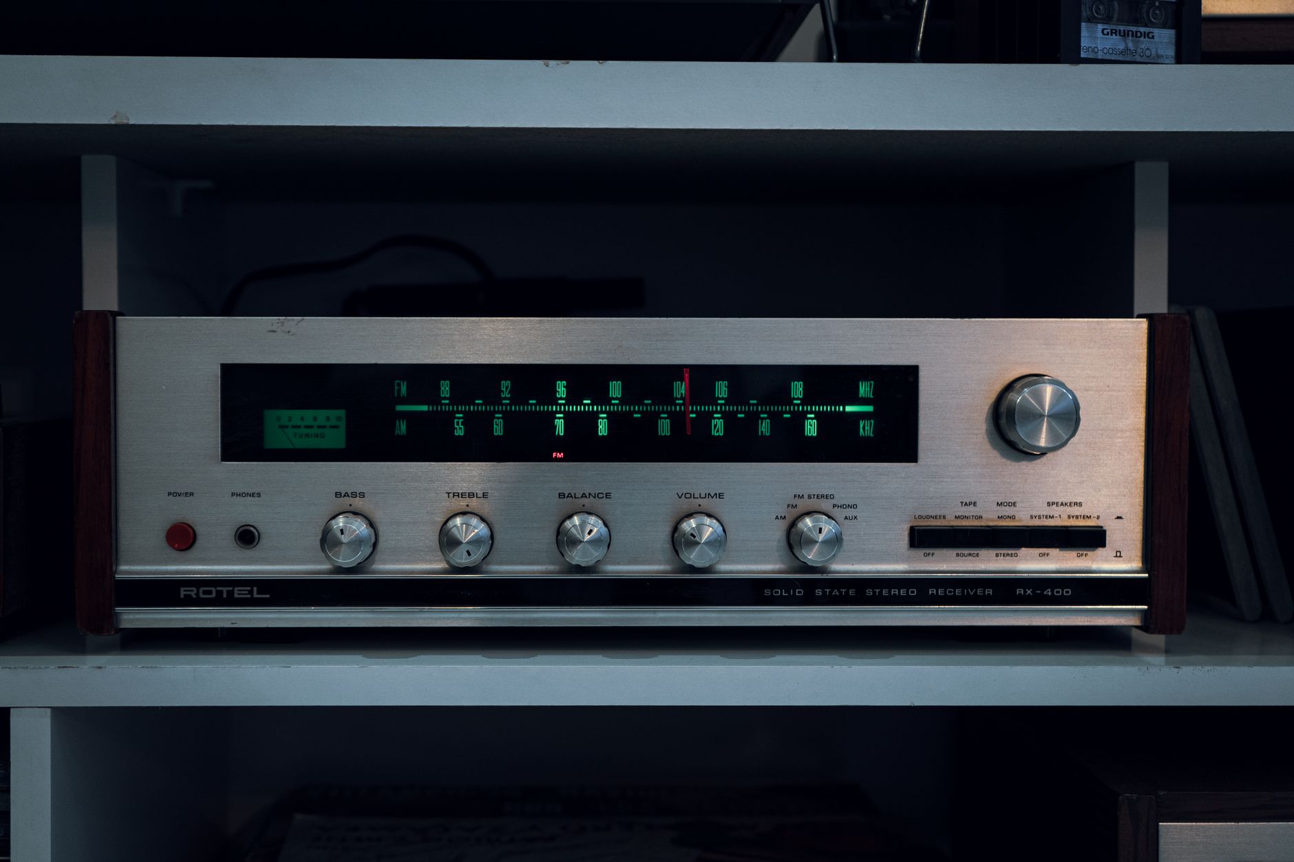 Retro Rotel stereo receiver RX 400 with classic controls and vintage appeal.