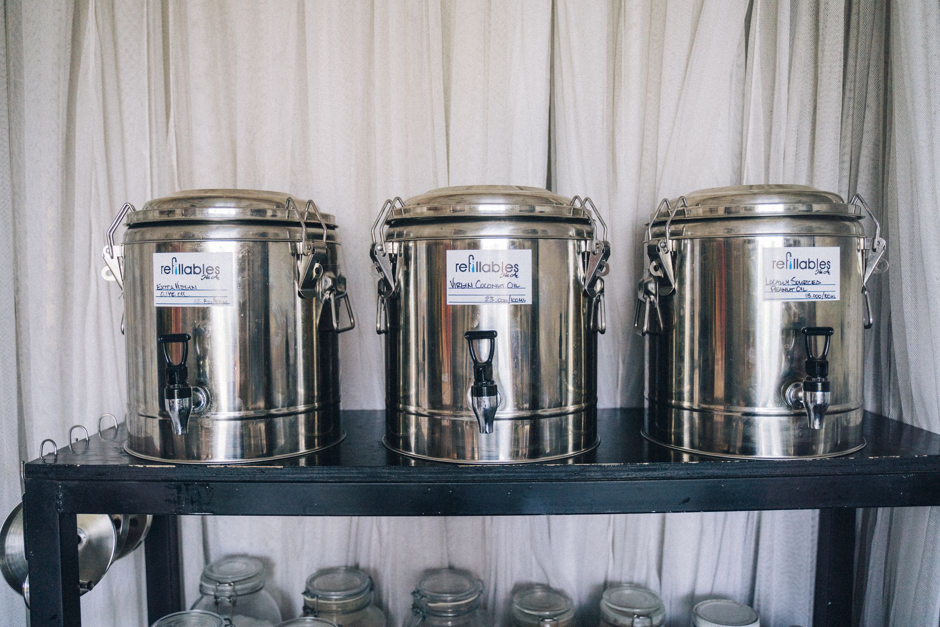 Triple set of steel containers for sustainable kitchen storage and zero waste solutions.