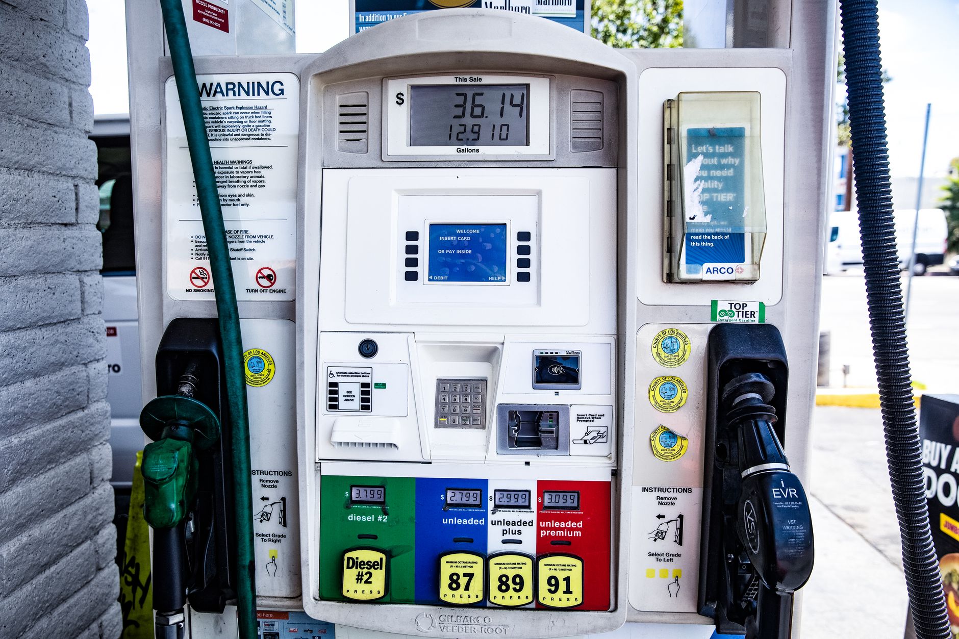 Close up of a fuel pump showing gasoline and diesel options at a gas station in Los Angeles.