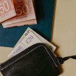 10 and 10 euro on black leather wallet
