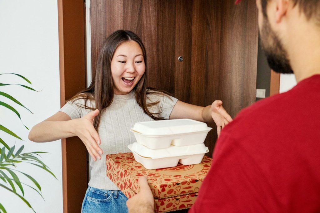 Food delivery makes a woman very happy.