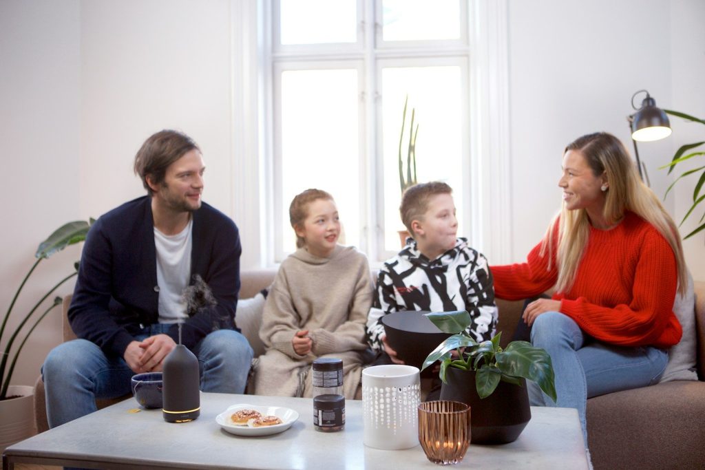 a group of people sitting around a table