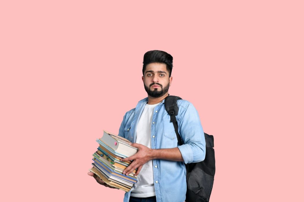 a man holding a book