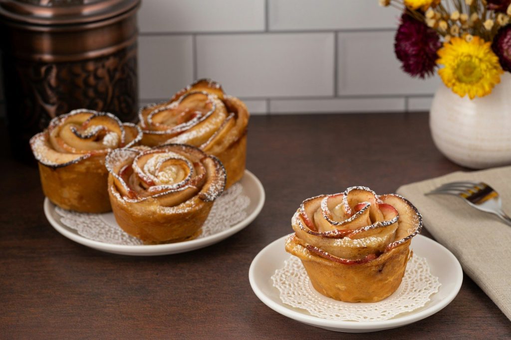 a couple of pastries on plates