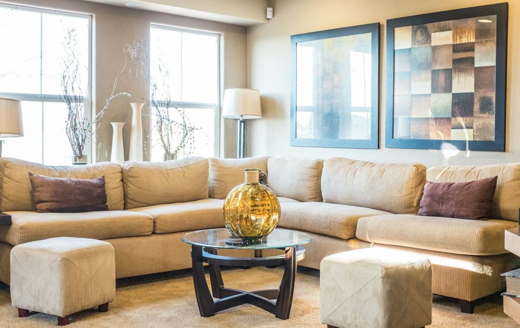 brown sofa in a room during daytime
