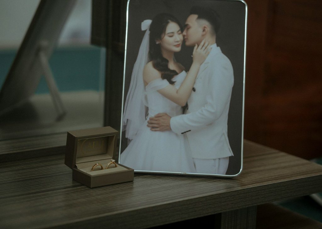 a picture frame with a picture of a bride and groom