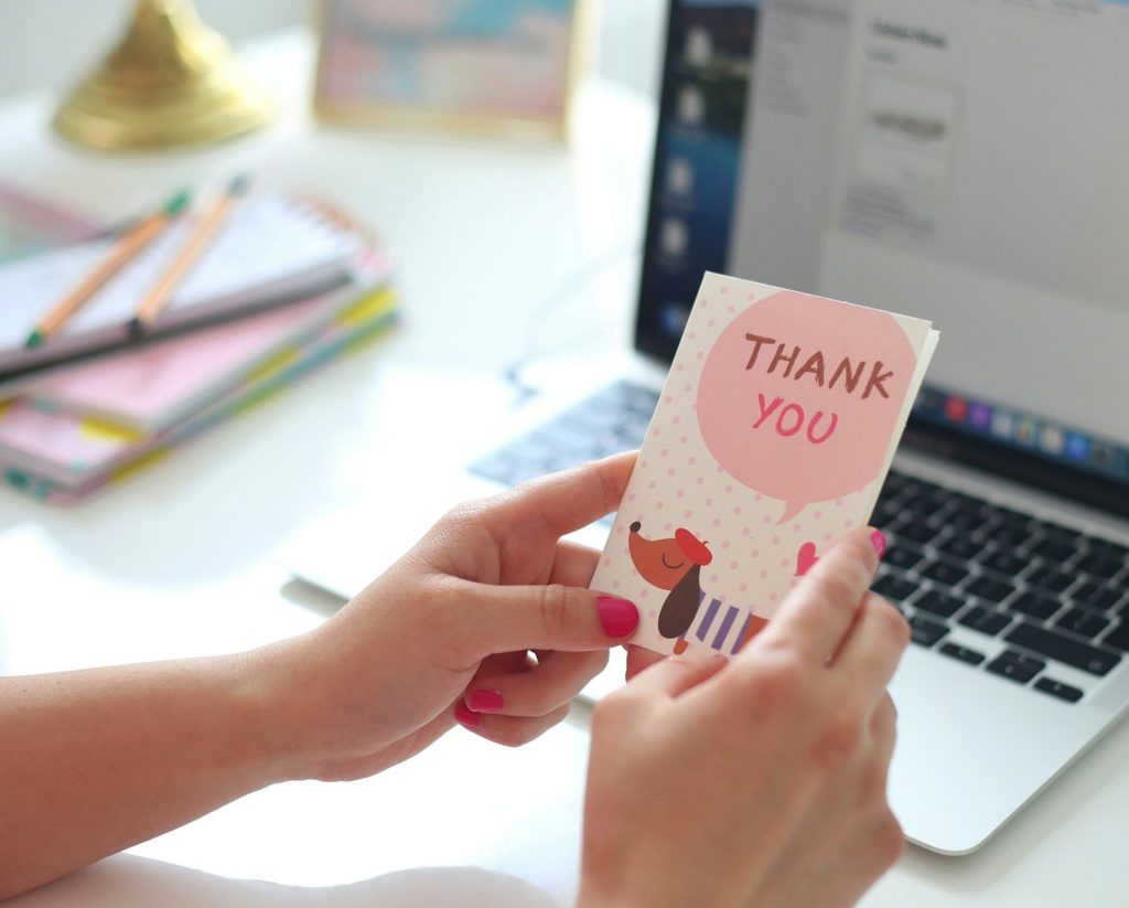 a person holding a card