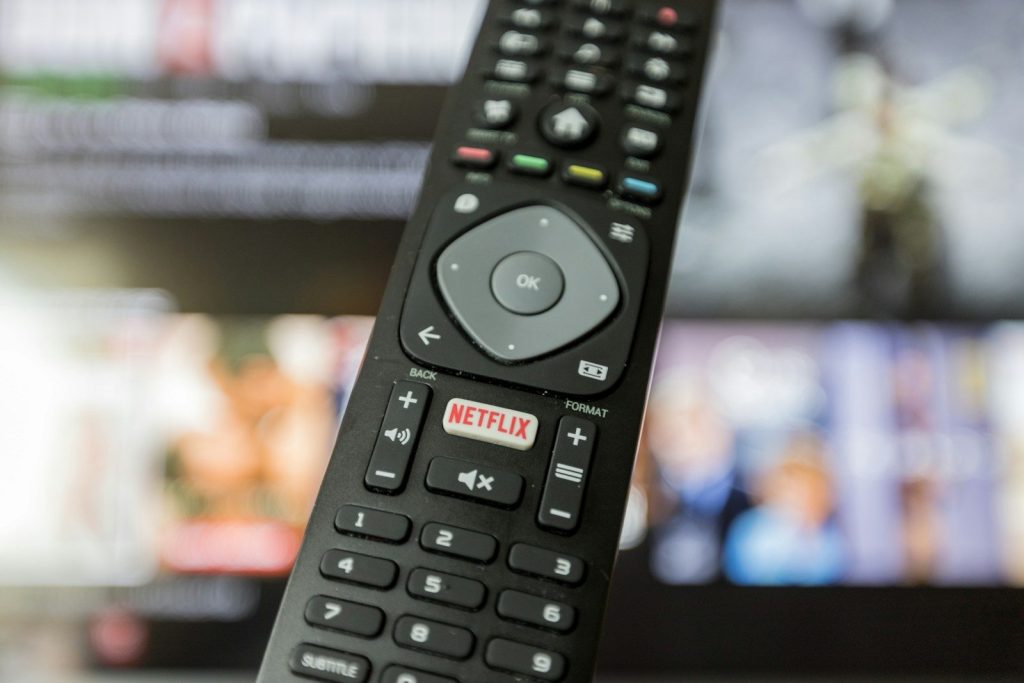 black remote control on black textile