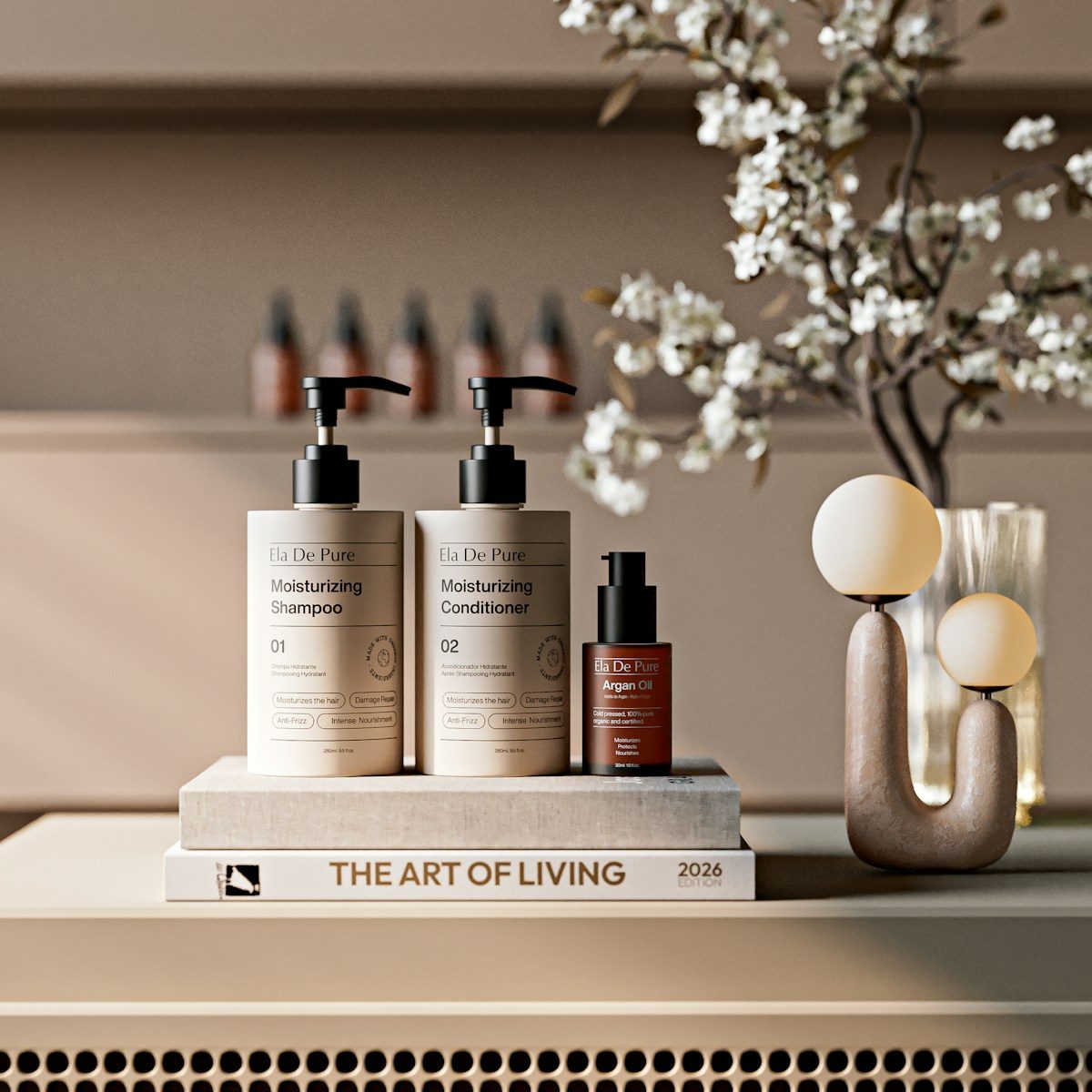 Shampoo, conditioner, and serum bottles on a book.