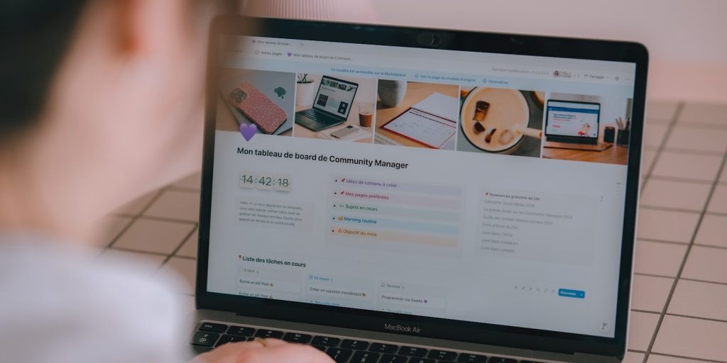Person looking at a laptop screen with website