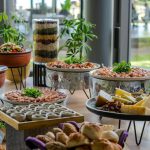 A table with a variety of food on it
