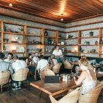 people sitting inside restaurant close-up photography