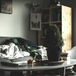 oval white wooden coffee table near vacant sofa