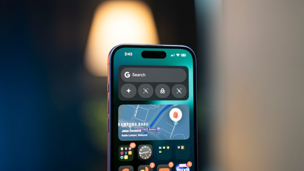 A close up of a person holding a cell phone