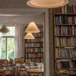 books on brown wooden shelf