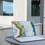 laptop on gray table