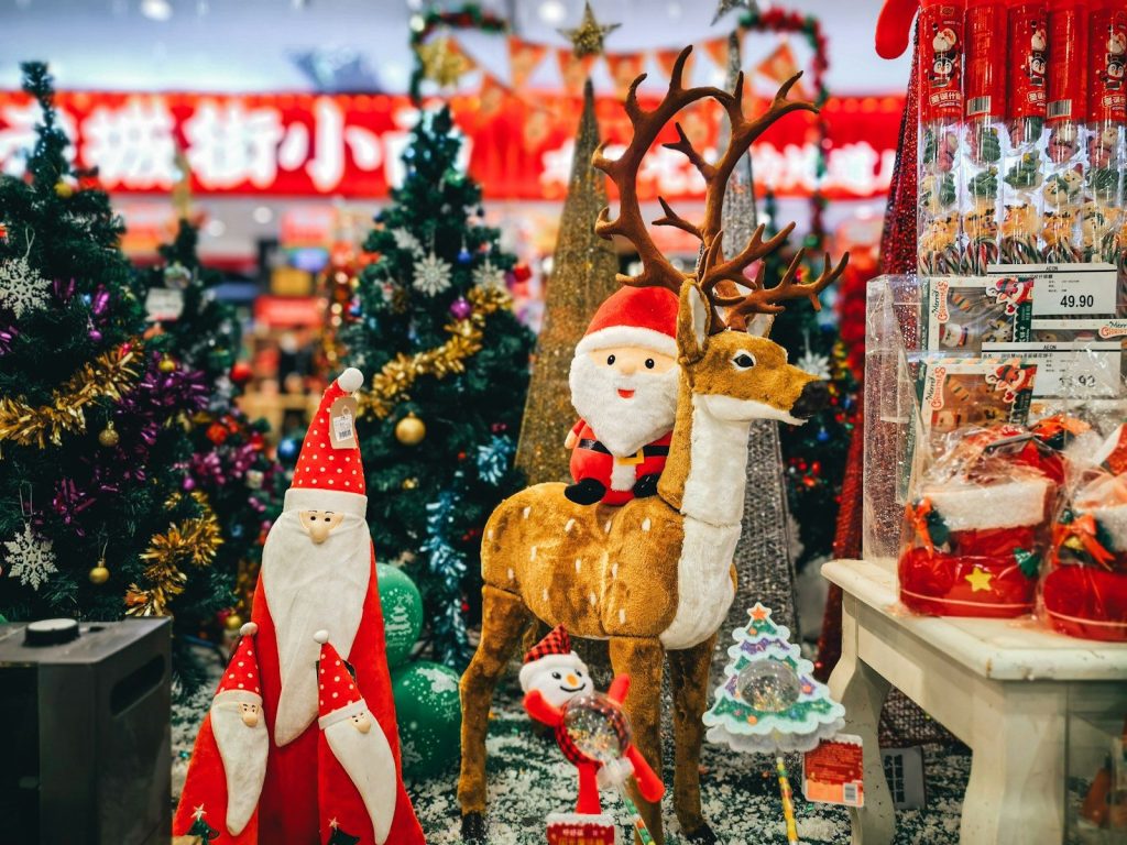 a christmas scene with santa claus and reindeer figurines