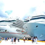 white cruise ship on dock during daytime